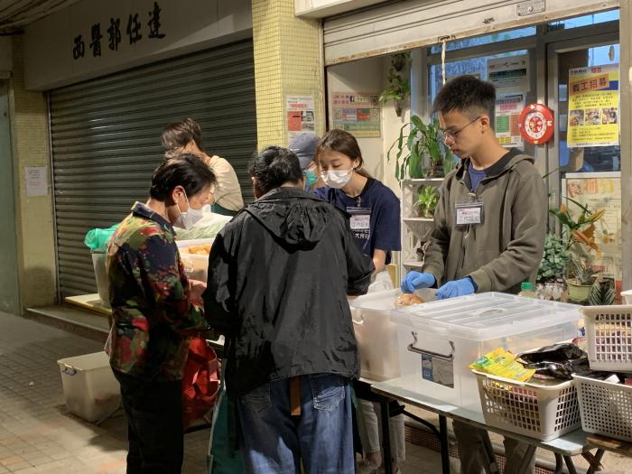 Volunteers redistributing food