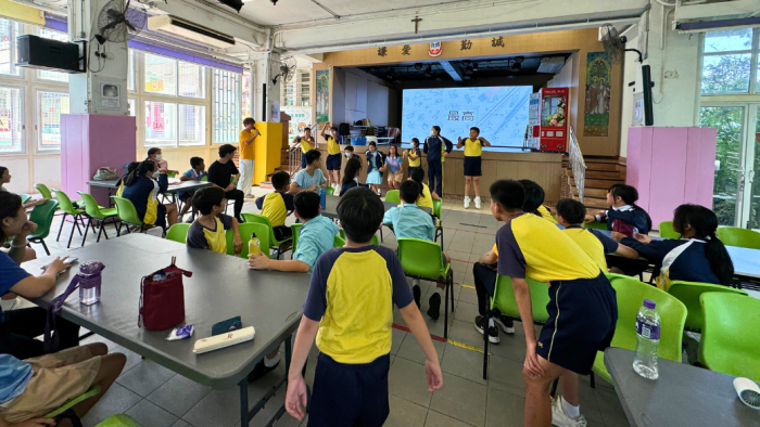 Students getting warmed up in team games