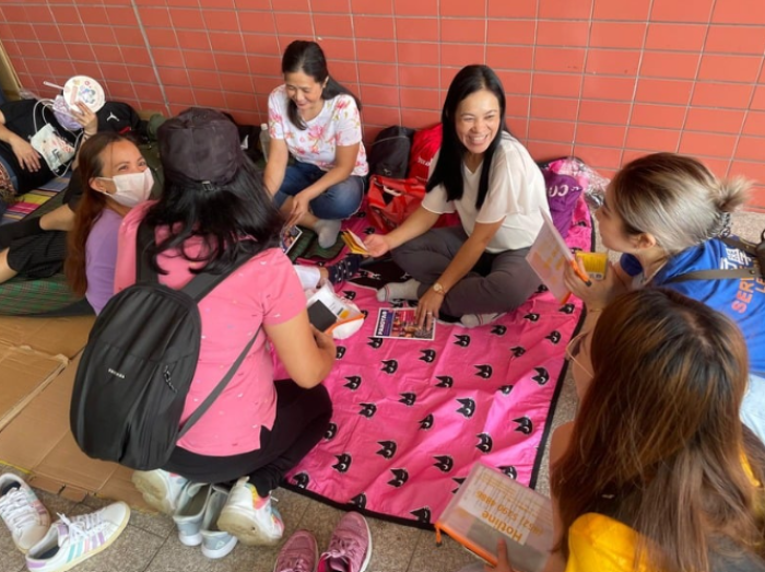 Volunteers engaging with migrant domestic workers