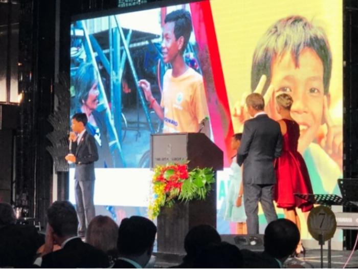 A child giving a speech on stage during CCF Gala