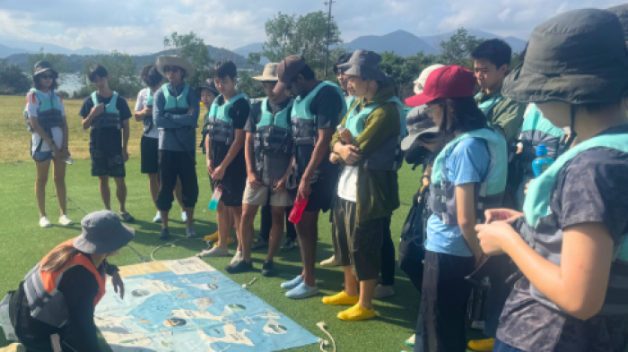 Volunteers getting briefed on their routes and tasks