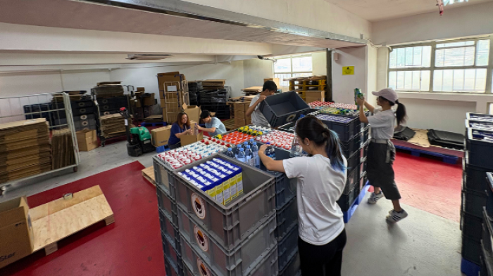 Volunteers packing food