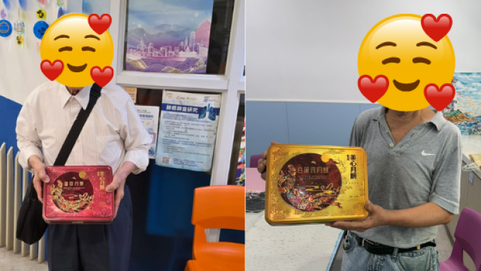 Charity partners distributing mooncakes to local families