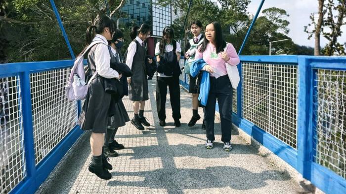 Volunteers demonstrating to the participants how forces work on Resonance Bridge