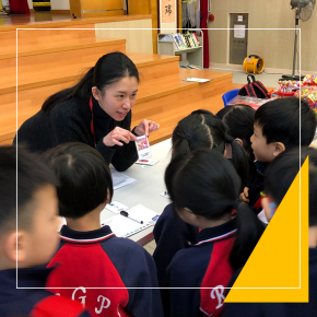 Students participating in card game